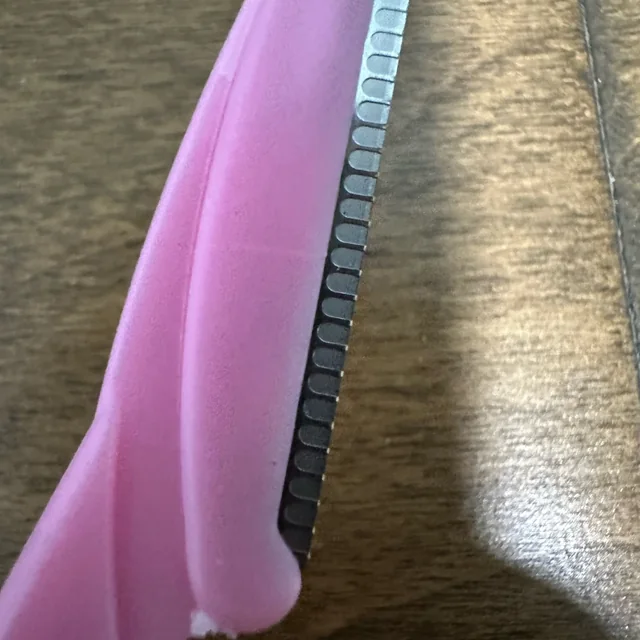 Peachly dermaplane razor photographed by a verified buyer